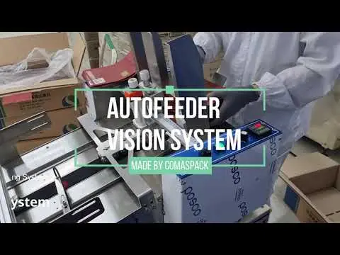 코마스팩 오토피더 비전시스템 유통기한 검사기 Comas Pack Auto feeding machine with vision inspection system.